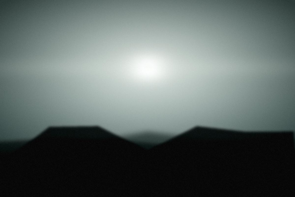 Low cloud across an estuary at first light.